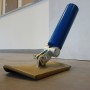 Lopende bronzen edger zonder handvat